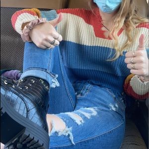 the whole outfit. sweater jeans and boots